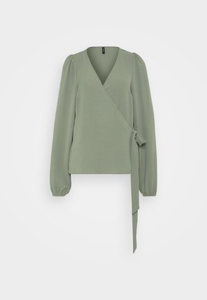 Wrap top in muted green, made of textured fabric. Features a deep V-neck, long puff sleeves, and a tie detail at the waist.