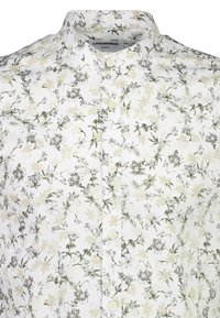 Biała koszula na guziki z kwiatowym wzorem w kolorach zielonym i beżowym. Dopasowany krój, miękka tkanina, z kołnierzykiem i małymi guzikami.