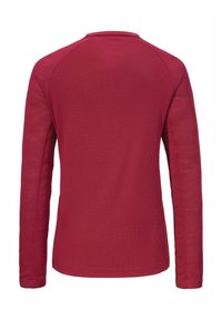 Rotes Langarmshirt mit strukturiertem, geripptem Muster und rundem Halsausschnitt; verfügt über Raglanärmel und einen geraden Saum.