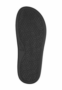 Black rubber shoe insole featuring a textured tread pattern with geometric shapes and a curved edge for comfort and support.