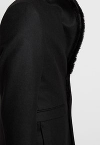 Twisted Tailor Abrigo clásico - black