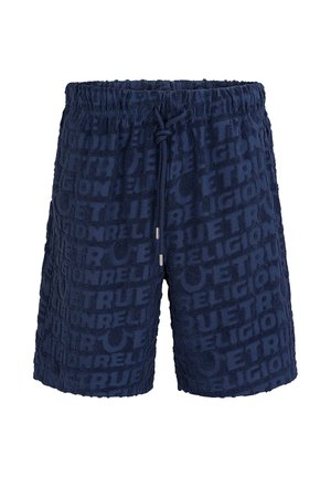 Shorts en éponge bleu marine avec taille élastique, cordon de serrage et motif en relief "TRUE RELIGION" sur toute la surface.