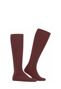 Calze al ginocchio bordeaux con texture a coste, esposte affiancate su uno sfondo bianco.