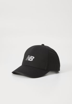Black cap with a curved brim, made of fabric. Features New Balance logo in gray on the front, six-panel design, and eyelets for ventilation.