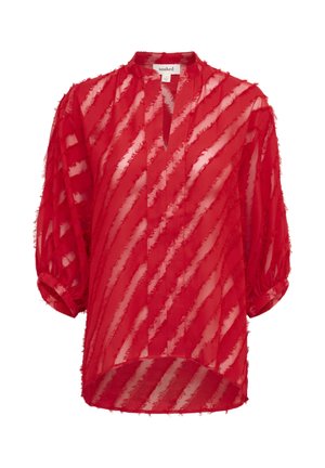 Červená priesvitná blúzka so pruhovaným vzorom. Má výstrih v tvare kľúčovej diery, 3/4 balónové rukávy a strapcové okraje. Voľný, prúdiaci dizajn.