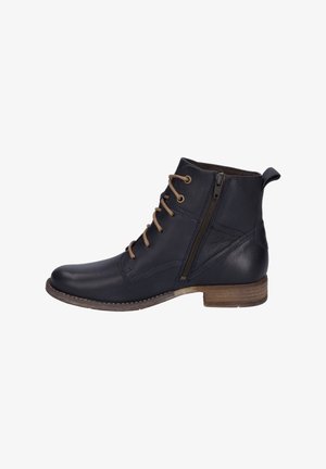 Botines de cuero azul marino con cordones marrones y cremallera lateral, puntera redonda y un tacón bajo de madera. Cuero texturizado con detalles de costura.