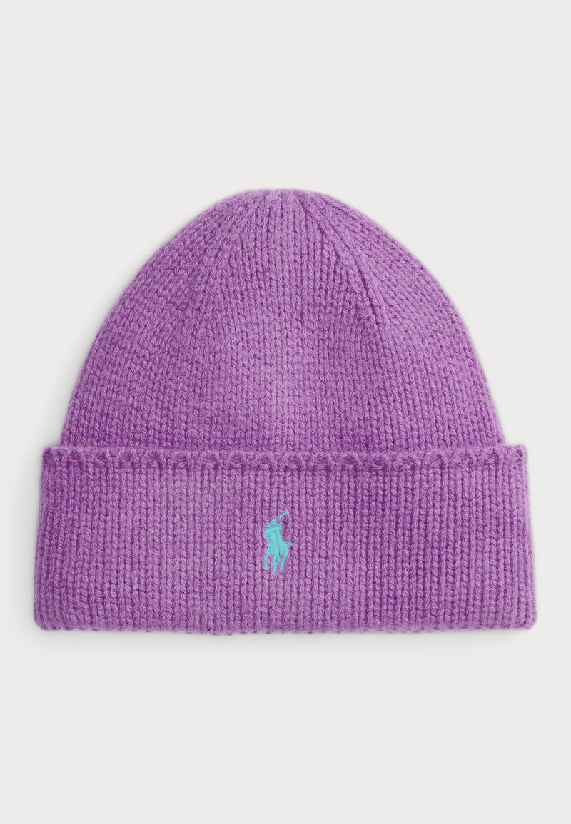 Violets adīts cepure ar salocītu malu, kurai ir mazs teālo logotipa elements. Izgatavota no strukturētas dzijas, lai nodrošinātu siltumu un komfortu.