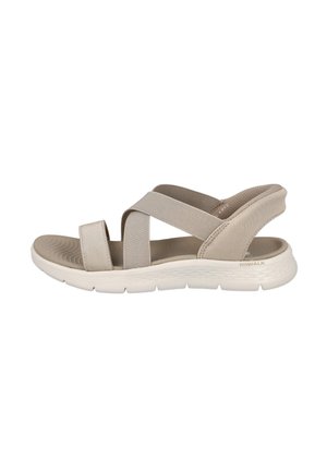 Sandalia casual beige con dos tiras elásticas anchas que cruzan el pie y una suela blanca gruesa y acolchada con la etiqueta "GOWALK".