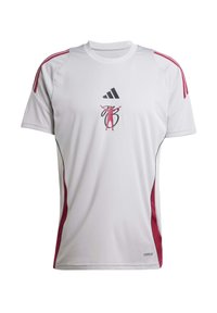 White athletic T-shirt with red stripes on the shoulders, featuring a central graphic print and "AEROREADY" tag at the hem.