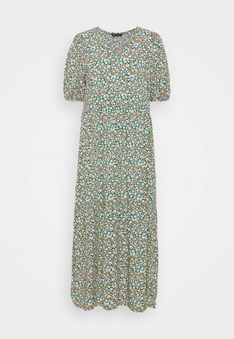Robe maxi florale verte, avec un décolleté en V, des manches courtes bouffantes et une taille cintrée. Le motif est composé de petites fleurs multicolores.
