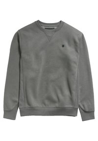 Šedá mikina z měkké látky. Má kulatý výstřih, žebrované manžety a jemné logo na hrudi. Hladká textura a jednoduchý design.