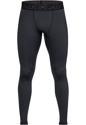 Schwarze Kompressionsleggins mit passgenauem Design, hergestellt aus glattem Material, ausgestattet mit einem breiten, markierten Bund und nahtloser Verarbeitung.