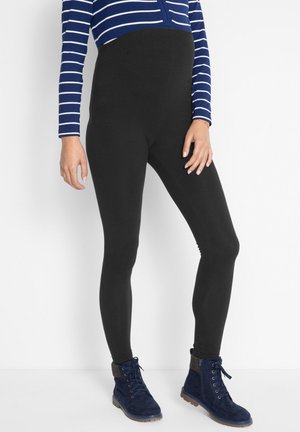 UMSTANDS - Leggings - black