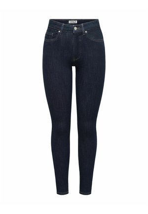 Jean skinny bleu foncé avec poches avant, fermeture à bouton et passants de ceinture, étiqueté "ONLY" à l'intérieur de la ceinture.