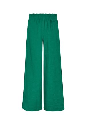 Pantalons larges verts en tissu texturé avec une taille élastique, caractérisés par une coupe ample et une surface froissée pour plus de détails.