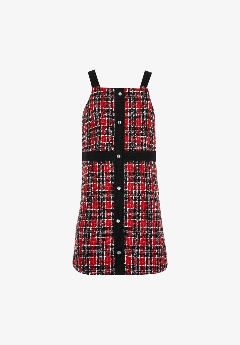 Robe sans manches à carreaux rouges et noirs avec des bandes noires verticales et horizontales et des boutons argentés sur le devant.