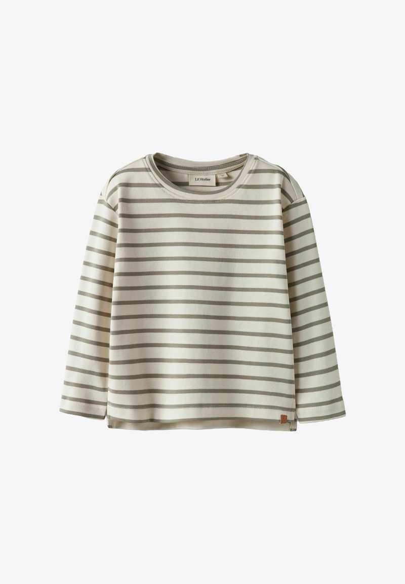 Light beige long-sleeve shirt with alternating thin dark stripes. Soft fabric, rounded neckline, and side slits with a small logo tag.