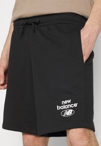 survêtement new balance homme