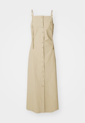 Maslinasto midi haljina s tankim naramenicama, kopčanjem na dugmad sprijeda i minimalističkim dizajnom od mekog, teksturiranog materijala. Bez uzoraka ili akcenata.