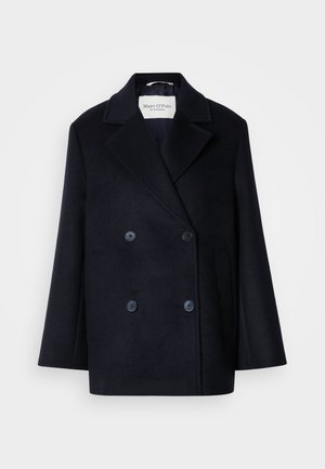 Manteau peacoat en mélange de laine navy avec une fermeture double boutonnage, revers cranté et deux poches latérales. Présente des boutons bleu foncé et une coupe décontractée.