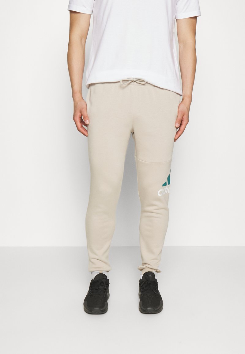 adidas Sportswear Tracksuit bottoms beige Zalando.ie