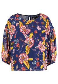 Blouse florale en tissu bleu marine. Présente de grandes fleurs roses et jaunes, des manches longues à volants et une ouverture en forme de trou de serrure à l'arrière.