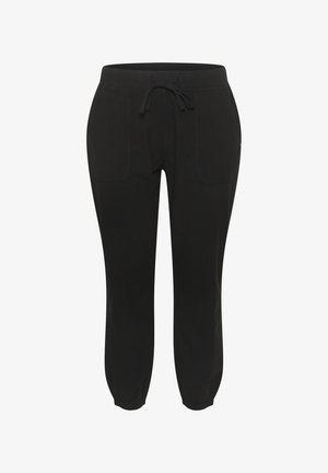 Černé tepláky s elastickým pasem a šňůrkou na stažení. Obsahují dvě přední kapsy a elastické manžety na kotnících. Hladká textura.