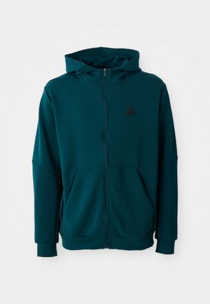 Teal zip-up hoodie with a front pocket and black logo. Features a hood, ribbed cuffs, and soft, textured fabric.