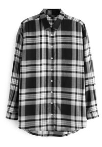 Chemise à carreaux noir et blanc, en tissu à texture lisse. Elle présente des manches longues, un col et un ourlet arrondi.
