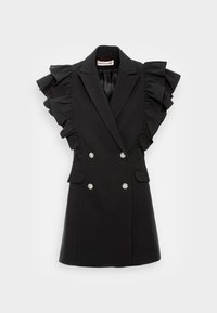 Svart skräddarsydd väst med volangärmar, dubbelknäppt fram och pärlliknande knappar. Tillverkad av mjukt tyg med en strukturerad form.