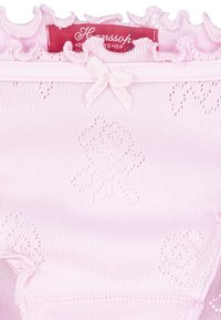 Pink knitted underwear with a ruffled waistband, featuring a small bow accent and delicate eyelet patterns throughout the fabric.