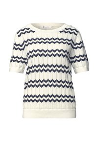 Pull en maille blanc à manches courtes avec des rayures en zigzag bleu marine et un col rond côtelé ainsi qu'un ourlet côtelé.