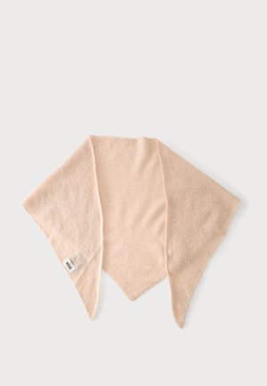 Soft beige triangular scarf with a small fabric tag on one corner, laid flat against a light gray background.