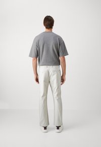 Tommy Hilfiger MERCER ESSENTIAL - Broek - bleached stone