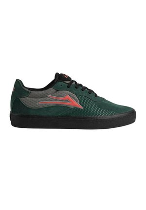 Dark green and gray suede sneaker with black sole, black laces, and red arrow-shaped logo on the side.