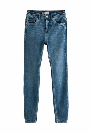 Jeans skinny in denim blu scuro con una texture liscia, dotati di cinque tasche, chiusura con zip e cuciture a contrasto lungo le cuciture.