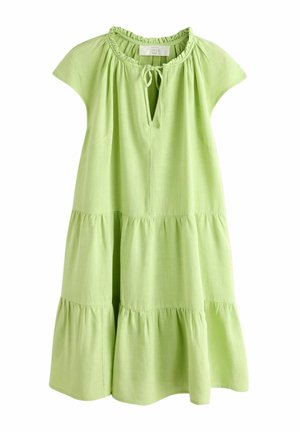 Šviesiai žalia lininė suknelė su raukšlėta iškirpte, raišteliu, trumpomis kapelės rankovėmis ir sluoksniuota sijonu. Turi laisvą siluetą ir laisvalaikio dizainą.