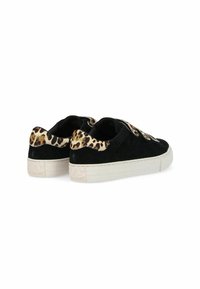 Black suede sneakers with leopard print accents on the heel, elastic strap closure, and a thick white sole featuring textured detailing.