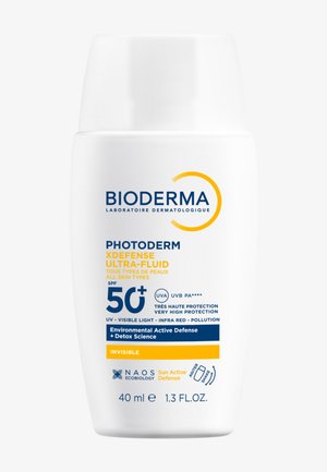 Soleil photoderm XDefense Ultra-Fluido di Bioderma, flacone di plastica bianca da 40 ml, SPF 50+, con testo blu e giallo e dettagli sulla protezione ambientale.