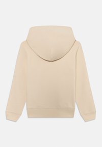 Felpa con cappuccio beige dal tessuto morbido, maniche lunghe e polsini e fondo a coste. Presenta un design semplice e minimalista.