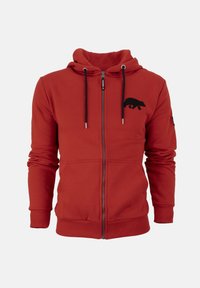 Felpa rossa con zip realizzata in tessuto morbido, con un silouette di orso ricamata sul lato sinistro del petto e cordini neri con punte argentate.