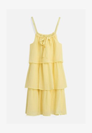 Robe jaune à étages sans manches avec fines bretelles et un nœud noué à l'encolure froncée, en tissu léger et texturé.