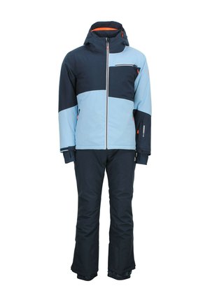 Tenue de ski comportant une combinaison de bleu et de marine, avec une veste zippée, une capuche et un pantalon assorti. Tissu texturé avec des poches et des accents.