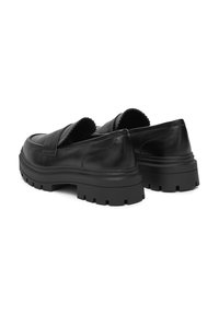 Pantofi loafers din piele neagră, cu talpă masivă și zimțată. Prezintă un finisaj neted, accente cosute și un design cu margine ondulată la gleznă.