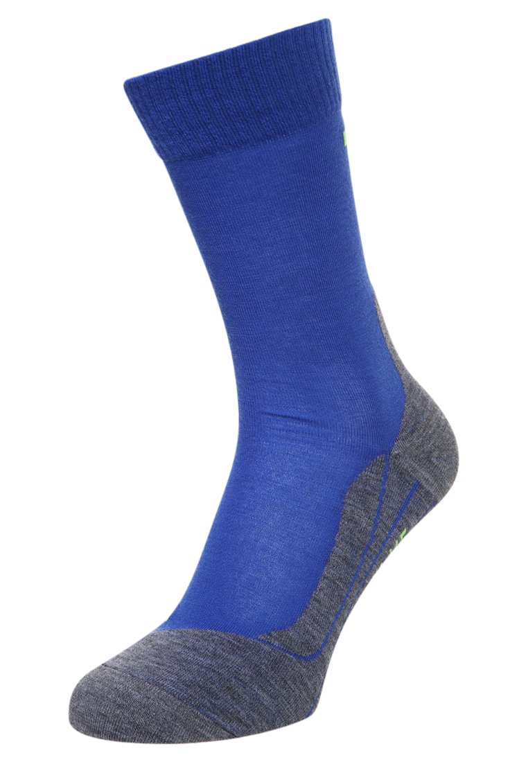 Calzino blu e grigio con polsino a coste, soletta imbottita e dettagli in un verde chiaro. Presenta una texture liscia e un design sportivo.