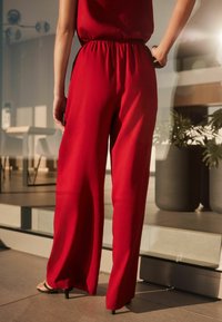 Next Kalhoty - red