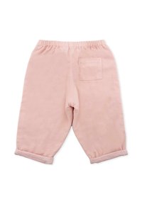 Lichtroze ribfluwelen broek met elastische tailleband, taps toelopende benen, omgeslagen manchetten en één achterzak. Zachte textuur en minimaal ontwerp.