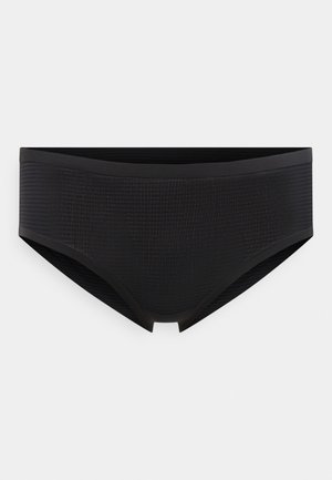 Slip noir avec un design texturé, doté d'une ceinture lisse et d'un détail découpé à l'avant, fabriqué en matériau extensible.