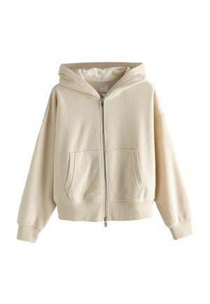 Cream-colored zip-up hoodie with a soft, fleece texture, featuring a large hood, two front pockets, and ribbed cuffs and hem.