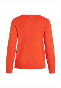 Pull en maille orange à manches longues avec col rond et poignets et ourlet côtelés, vu de dos sur fond blanc.